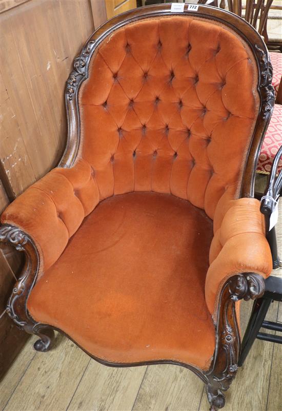 A Victorian mahogany buttonback armchair, russet